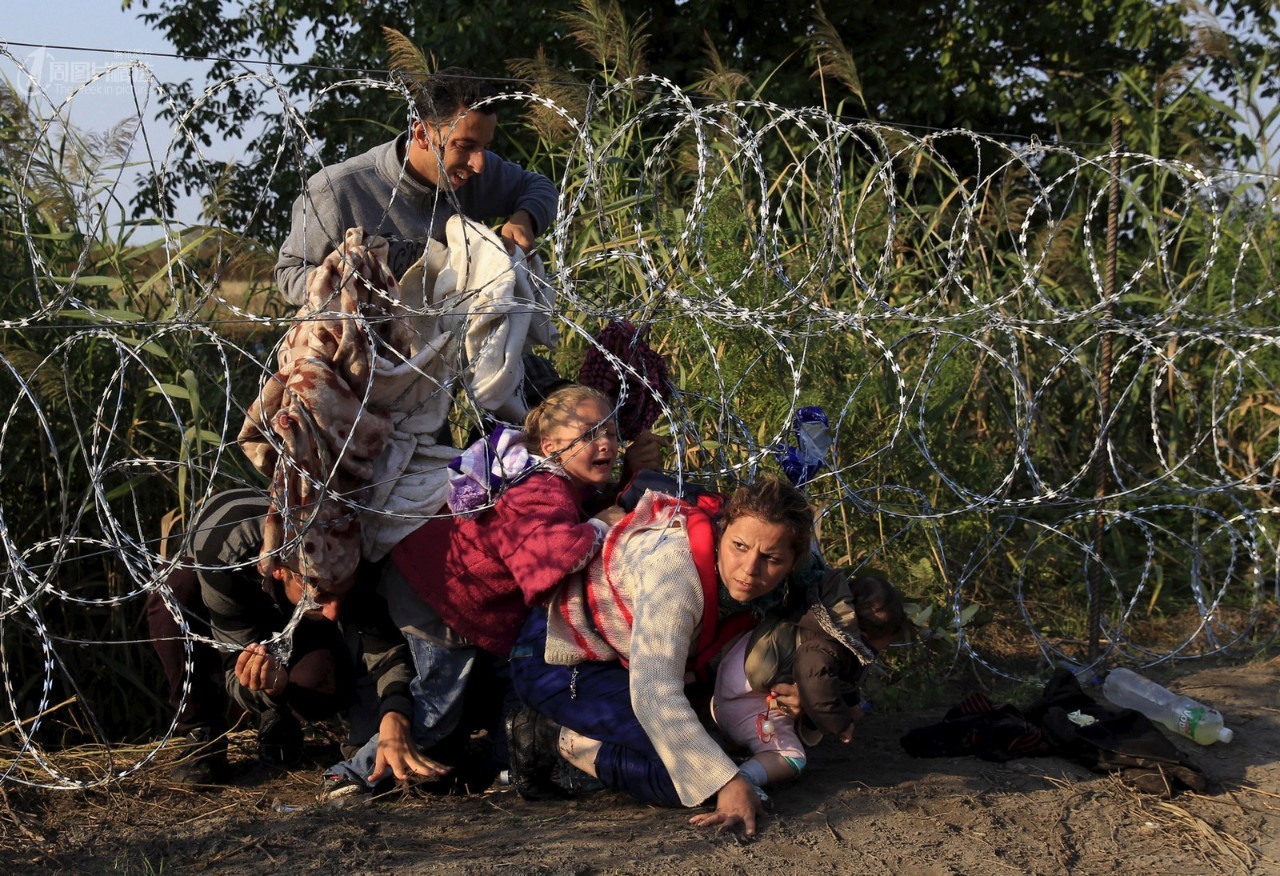 难民隔离墙图片