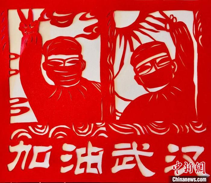 哈尔滨市群众艺术馆国家级非遗传承人倪秀梅剪纸作品 王琳 摄